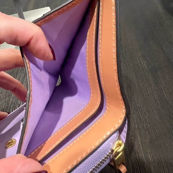 Tory Burch Embossed Monogram Bi-fold Wallet - Picture 4 of 6